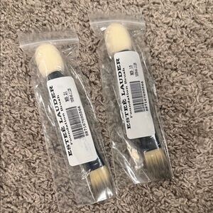 Estee Lauder Skincare Tool with Cream and Black Handle